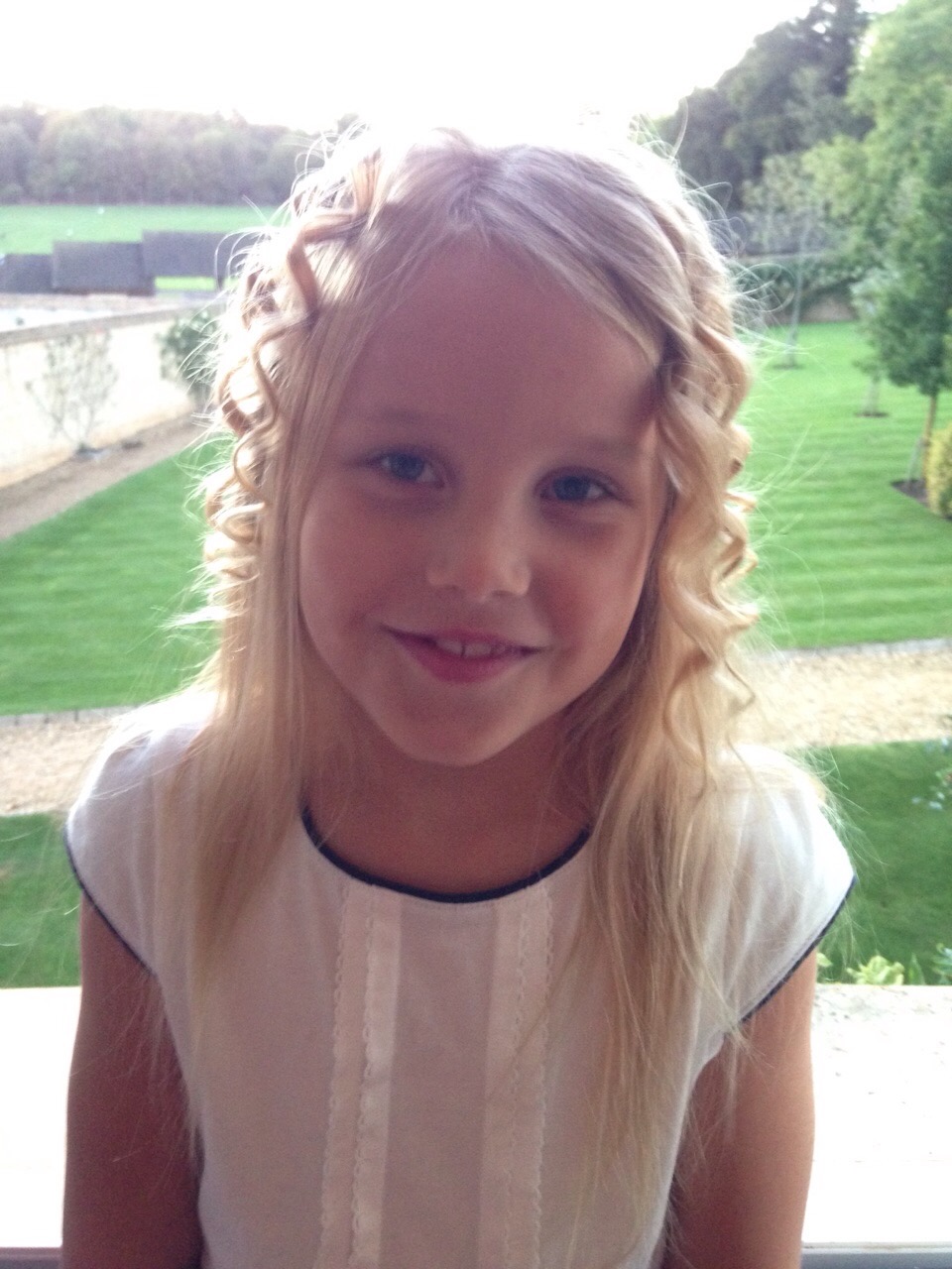Siena age 8 in English garden
